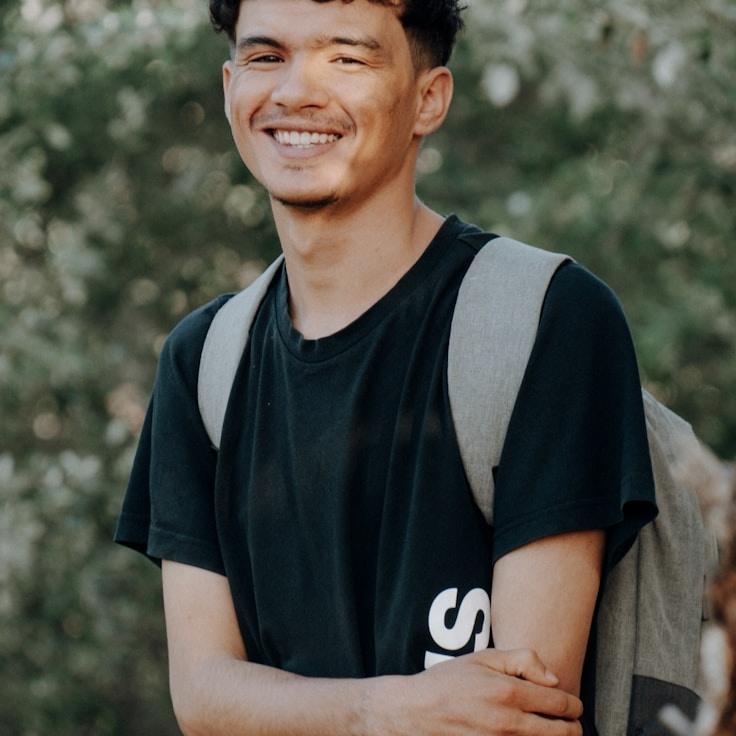 Portrait of Aiden Cole, community mentor and Italian cuisine specialist